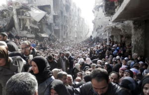 Syrian Refugees Waiting For Food Distribution